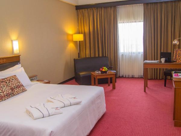 Hotel Grand Continental Kuching : photo 2 de la chambre chambre double ou lits jumeaux premium