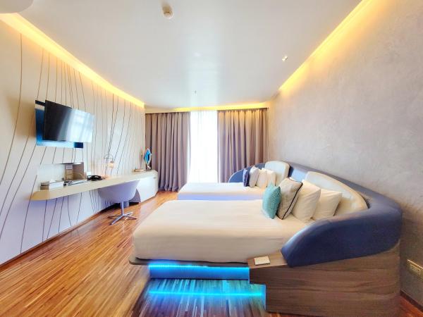 Hotel Baraquda Heeton Pattaya by Compass Hospitality : photo 1 de la chambre chambre lits jumeaux deluxe