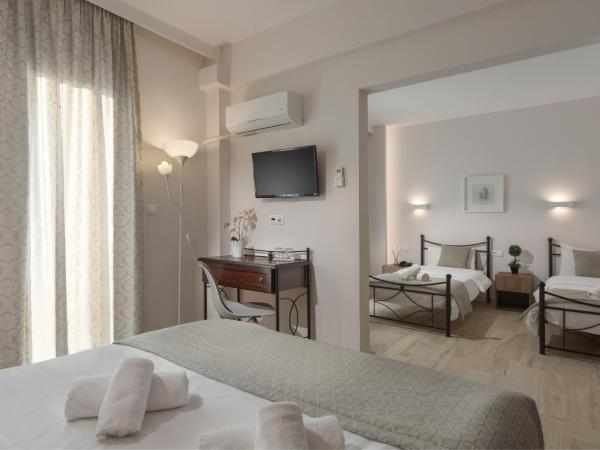 Minavra Hotel : photo 1 de la chambre chambre quadruple supérieure - vue sur mer