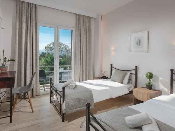 Minavra Hotel : photo 10 de la chambre chambre quadruple supérieure - vue sur mer