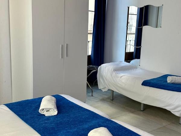 Nest Style Granada : photo 8 de la chambre chambre triple