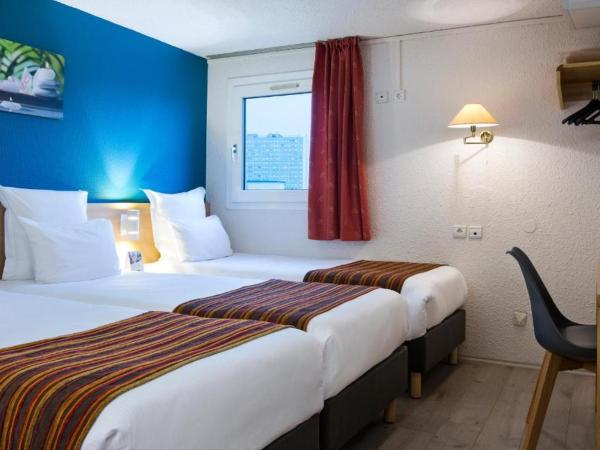 Comfort Hotel Montlucon : photo 1 de la chambre chambre triple - non-fumeurs