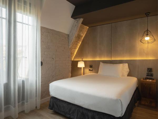 Hotel Tayko Bilbao : photo 1 de la chambre chambre simple avec balcon – vue sur rivière
