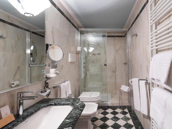 Grand Hotel Ortigia : photo 3 de la chambre suite lit king-size