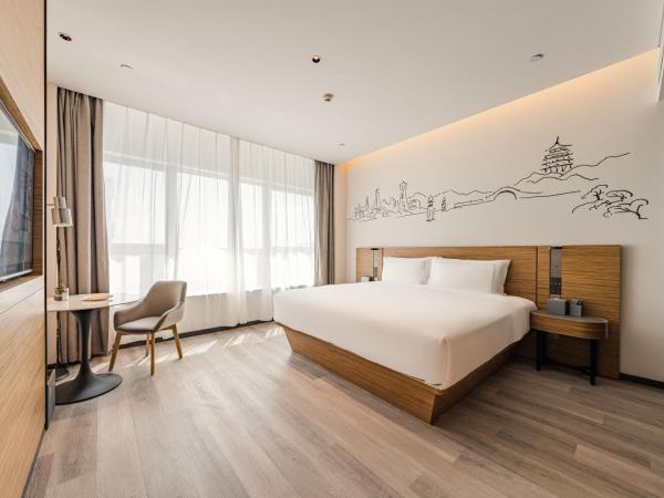 UrCove by HYATT Hangzhou Riverside CBD : photo 2 de la chambre suite exécutive