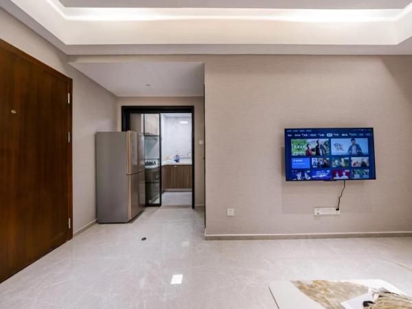 Excellence International Apartment - Convention & Exhibition Center : photo 8 de la chambre chambre supérieure lit queen-size