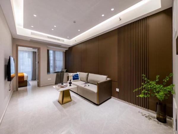 Excellence International Apartment - Convention & Exhibition Center : photo 2 de la chambre chambre supérieure lit queen-size