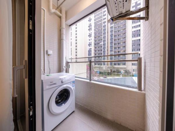 Excellence International Apartment - Convention & Exhibition Center : photo 8 de la chambre suite 2 chambres