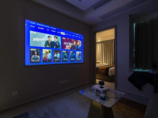 Excellence International Apartment - Convention & Exhibition Center : photo 7 de la chambre light luxury audio-visual one-bedroom and one-bathroom [72-inch projection + tencent membership + large refrigerator + washing machine