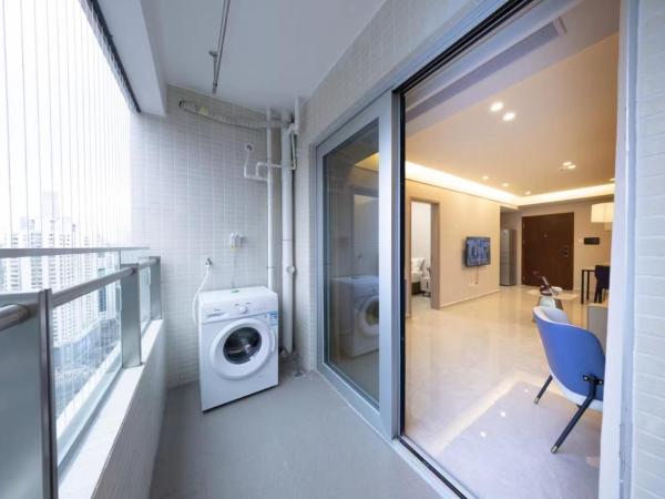 Excellence International Apartment - Convention & Exhibition Center : photo 10 de la chambre chambre supérieure lit queen-size