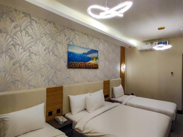 GOLD SKY AVENUE HOTEL : photo 2 de la chambre chambre quadruple