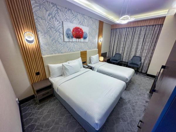 GOLD SKY AVENUE HOTEL : photo 4 de la chambre grande chambre double ou lits jumeaux