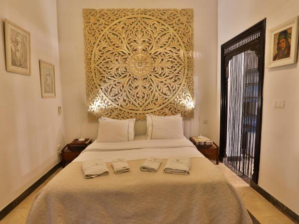 Dar Souad : photo 8 de la chambre chambre double supérieure avec deux lits doubles
