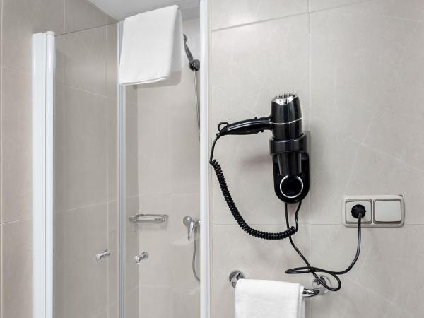 Hotel Los Girasoles : photo 1 de la chambre chambre triple