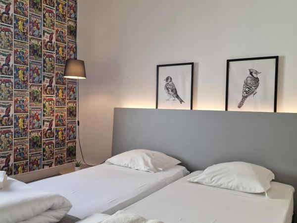 Castilho 63 Hostel & Suites : photo 4 de la chambre chambre quadruple avec salle de bains privative