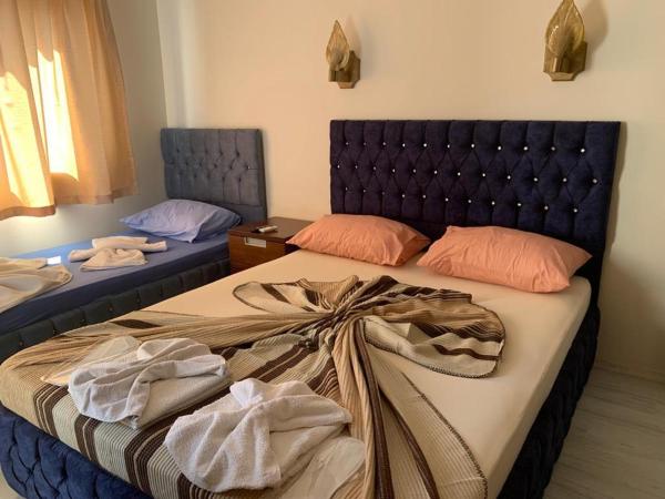 Ramos Hotel Kuşadası : photo 2 de la chambre chambre triple