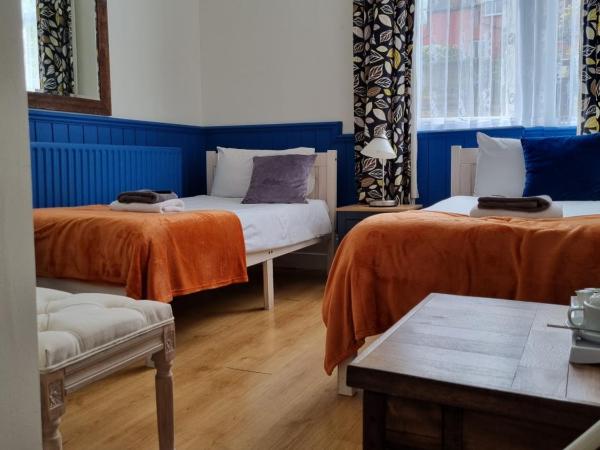 The Windmill Hotel : photo 6 de la chambre chambre lits jumeaux