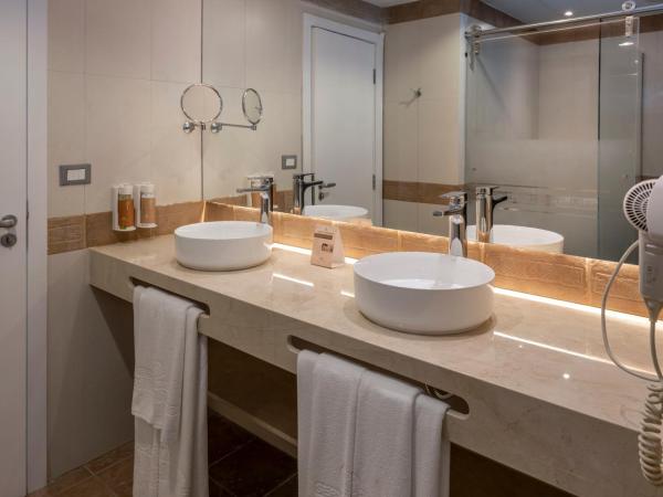 Serhs Natal Grand Hotel & Resort : photo 4 de la chambre appartement familial prime - vue latérale sur mer