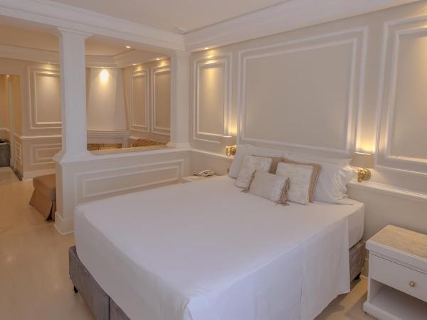 Lizon Curitiba Hotel : photo 2 de la chambre suite lit king-size avec baignoire spa