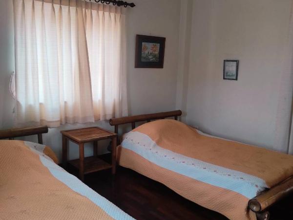 Chiang Mai Homey : photo 8 de la chambre chambre lits jumeaux avec salle de bains commune