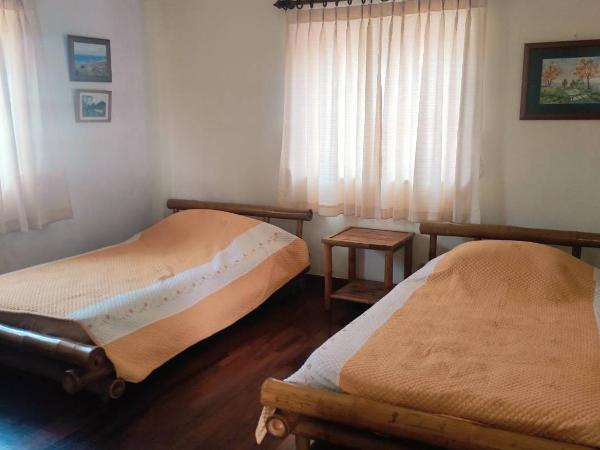 Chiang Mai Homey : photo 6 de la chambre chambre lits jumeaux avec salle de bains commune