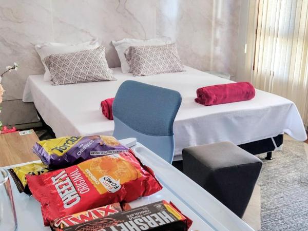 Éden Pampulha - Hotel Coworking : photo 8 de la chambre suite deluxe avec lit king-size