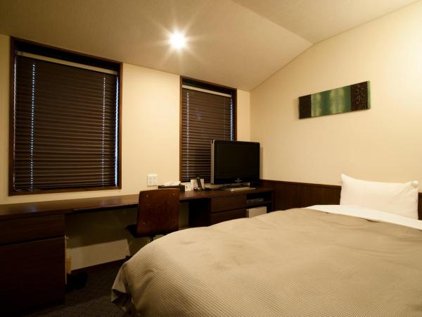 Ochanomizu Hotel Shoryukan : photo 2 de la chambre chambre double avec petit lit double - non-fumeurs