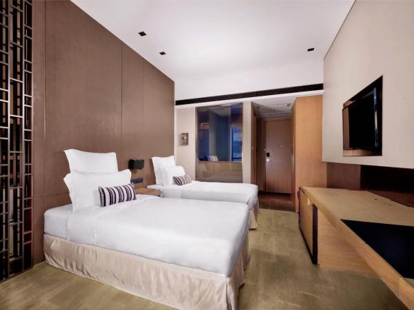 Nina Hotel Kowloon East : photo 1 de la chambre chambre lit king-size ou lits jumeaux blissful 
