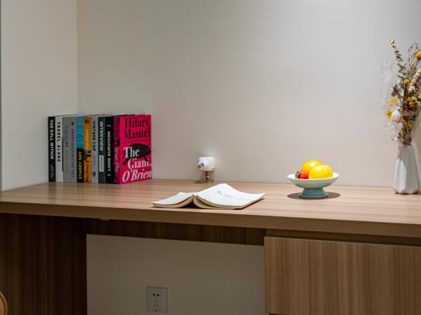 Chengdu Yayu Aparthotel : photo 4 de la chambre chambre lit queen-size deluxe