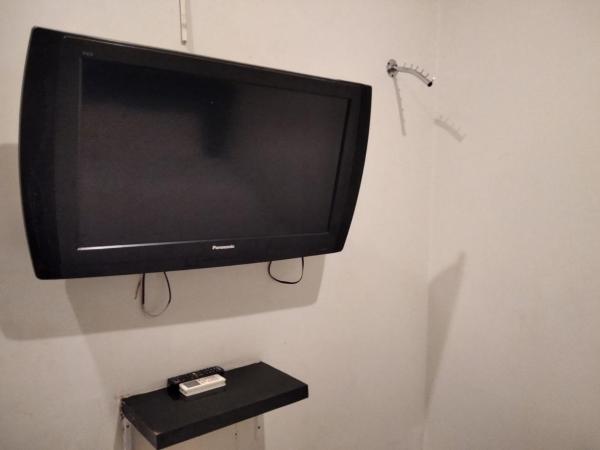 Gangnam Style Residence Mitra RedDoorz near MERR Surabaya : photo 1 de la chambre chambre double deluxe