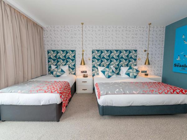 Hilton Bournemouth : photo 1 de la chambre chambre lit king-size avec lit simple d’appoint