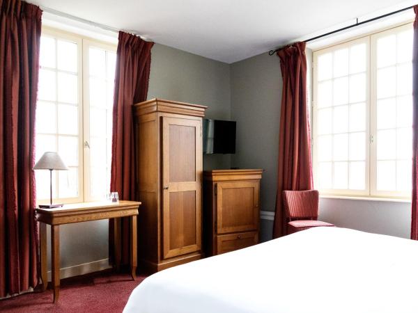 La Mère Poulard : photo 1 de la chambre chambre double ou lits jumeaux - vue sur baie du mont-saint-michel - annexe maison rouge