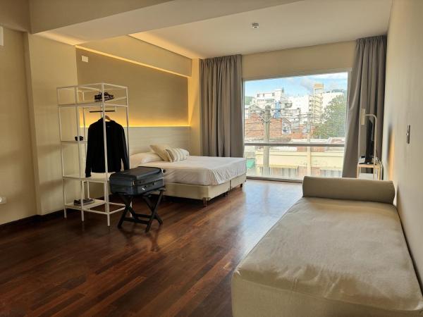Roomie Salta by DOT Suites : photo 1 de la chambre chambre triple