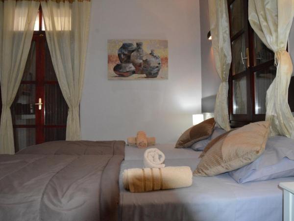 Enetiko Rooms : photo 6 de la chambre chambre double ou lits jumeaux avec balcon