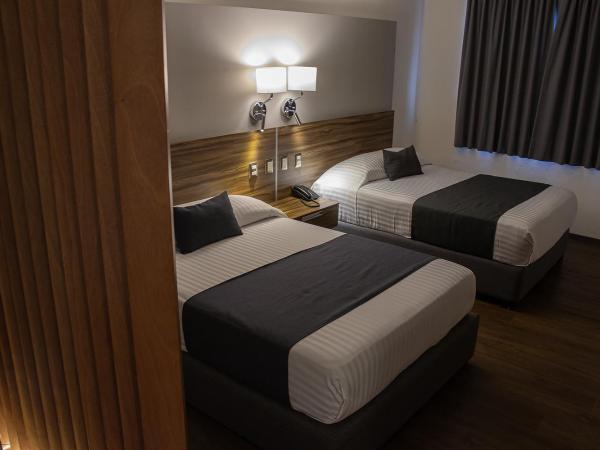 Estanza Hotel & Suites : photo 6 de la chambre suite familiale