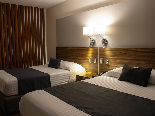 Estanza Hotel & Suites : photo 5 de la chambre suite familiale