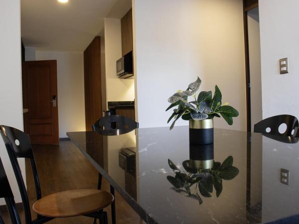 Estanza Hotel & Suites : photo 3 de la chambre suite familiale