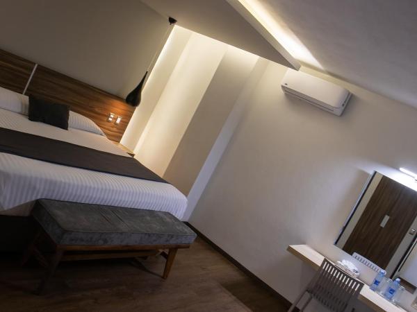 Estanza Hotel & Suites : photo 7 de la chambre suite familiale