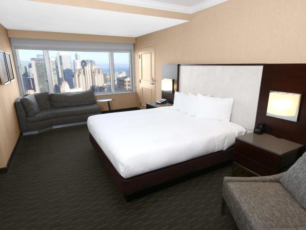 Hilton San Francisco Union Square : photo 1 de la chambre suite junior lit king-size - vue sur ligne d'horizon
