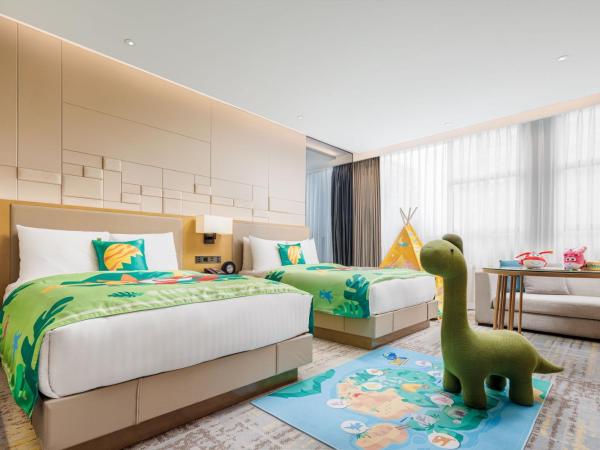 Chengdu Marriott Hotel Financial Centre : photo 7 de la chambre family room with two twin beds and twin towers view