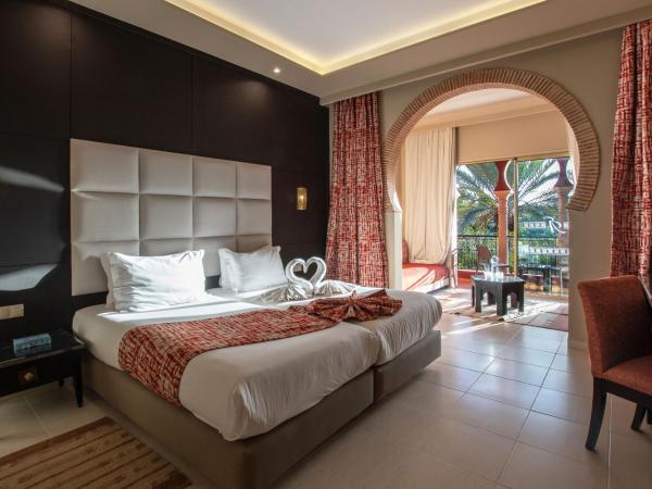 Eden Andalou Aquapark & Spa : photo 1 de la chambre chambre double deluxe avec canapé-lit - côté piscine