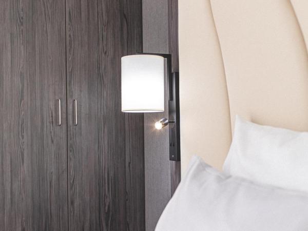 Best Western Plaza Hotel Mannheim : photo 8 de la chambre deluxe quadruple room with one double and two single beds