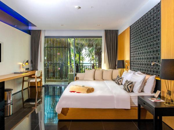Ramada Resort by Wyndham Khao Lak : photo 2 de la chambre chambre lit king-size deluxe avec bain à remous