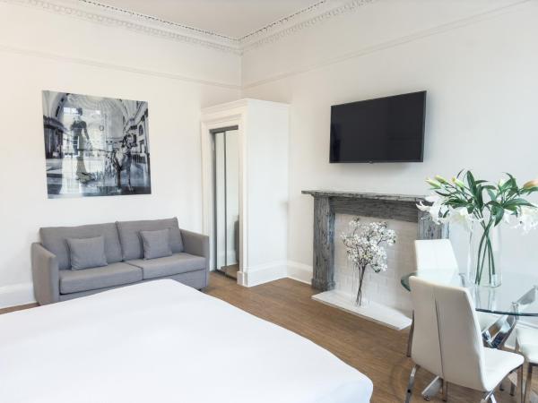 Hanover 71 Suites : photo 5 de la chambre suite deluxe avec baignoire spa