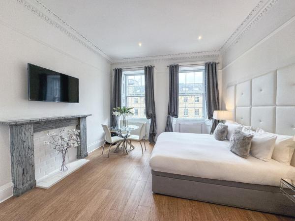 Hanover 71 Suites : photo 8 de la chambre suite deluxe avec baignoire spa