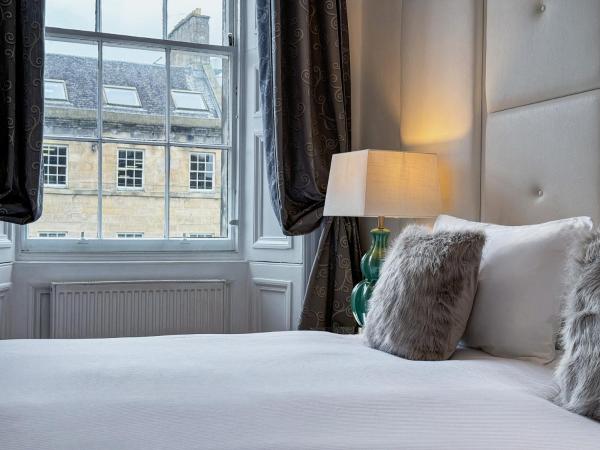 Hanover 71 Suites : photo 3 de la chambre suite deluxe avec baignoire spa