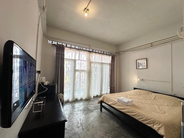 OYO 75472 GOTUM Hostel 2 & Money Exchange : photo 3 de la chambre chambre deluxe