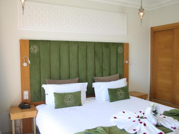 Diwane Hotel & Spa Marrakech : photo 5 de la chambre chambre double ou lits jumeaux deluxe - vue sur piscine