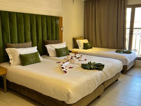 Diwane Hotel & Spa Marrakech : photo 7 de la chambre chambre double ou lits jumeaux deluxe - vue sur piscine