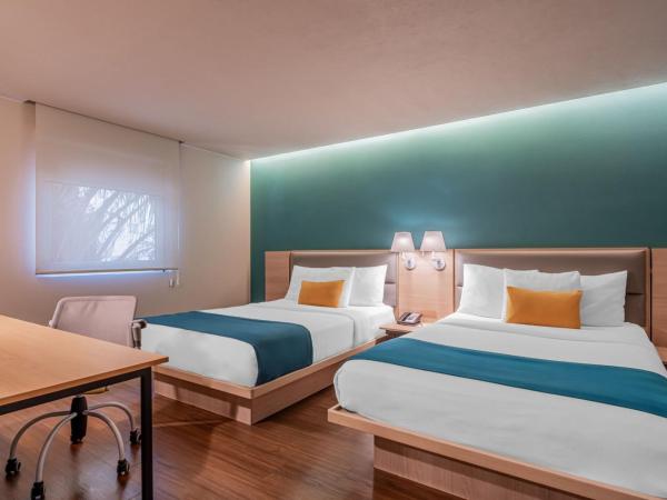 City Express Suites by Marriott Queretaro : photo 1 de la chambre junior double suite with two double beds and sofa bed